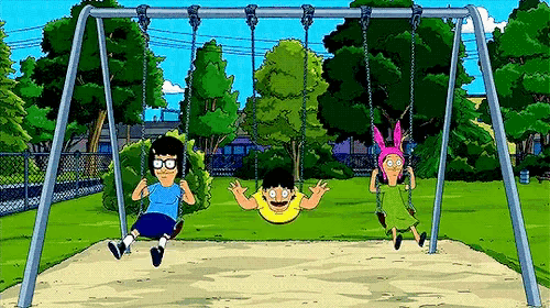 a group of cartoon characters are playing on a swing set in a park .