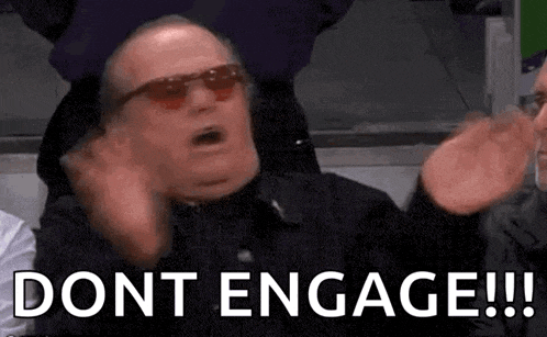 a man wearing sunglasses is making a funny face and saying `` dont engage '' .
