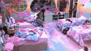 a room with a lot of beds and a sign that says ' erick 2013 ' on it