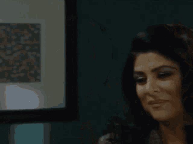 two women are looking at each other and smiling for the camera