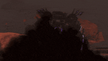 a purple light is shining on a person with the letter c on their chest