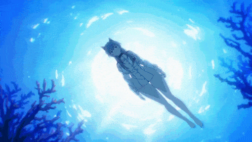 a cat girl is swimming in the ocean