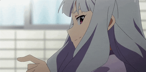 a girl with gray hair and red eyes is pointing