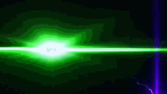 a green light is coming out of a dark room