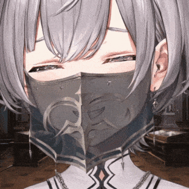 a close up of a person wearing a mask with the letter g on it