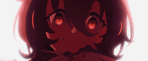 a close up of a cartoon character with red eyes