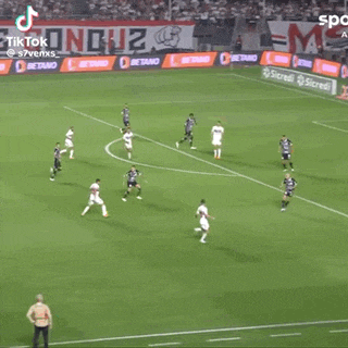 a soccer game is being played on a field with a banner that says morum .