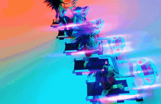 a group of people are dancing on a set of stairs with a purple light behind them