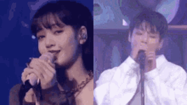 a woman is singing into a microphone and a man is singing into a microphone .