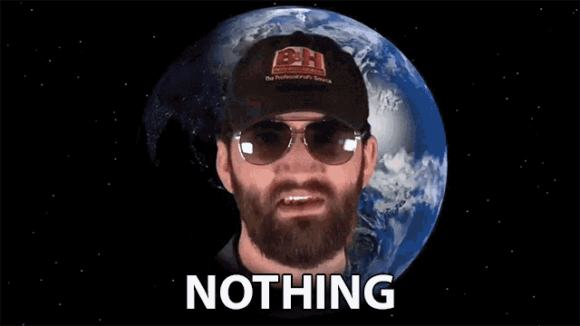 a man with a beard wears sunglasses and a bh hat