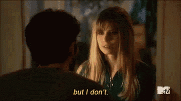 a man and a woman are talking to each other and the woman says but i don 't