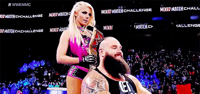 a woman is standing next to a man in a mixed match challenge