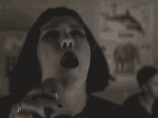 a woman singing into a microphone with the words " my girl " below her