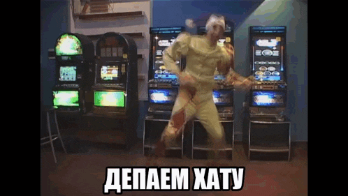 a man in a zombie costume is dancing in front of a bunch of slot machines with the words " depaem katy " below him