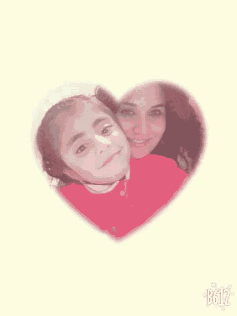a woman and a little girl are posing for a picture in a heart shaped frame ..