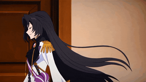 a woman with long black hair is standing in front of a door with her eyes closed