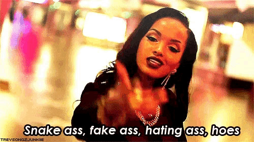 a woman is saying snake ass fake ass hating ass hoes