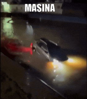 a car is stuck in a flooded street and the word masina is on the bottom