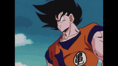 a close up of a dragon ball z character with chinese writing on his shirt