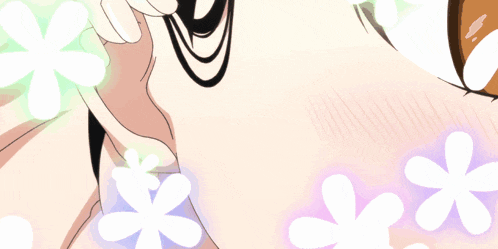 a close up of a girl 's face with flowers surrounding it