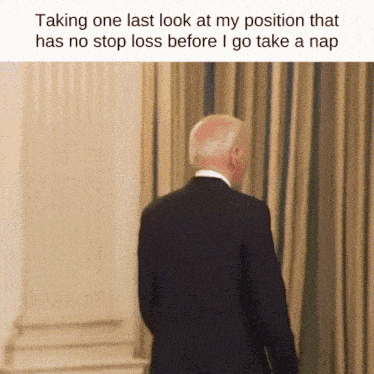 a man in a suit is standing in front of a window with the caption taking one last look at my position