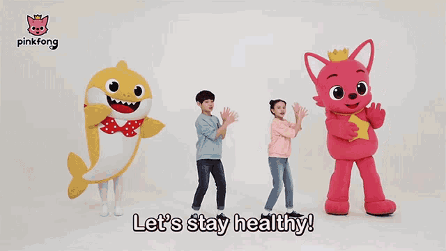 a pinkfong ad shows a shark and two children