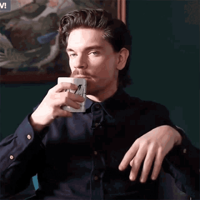 Sipping Coffee Robin James GIF - Sipping Coffee Robin James Drinking Coffee GIFs