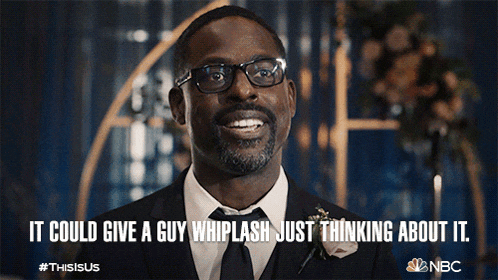 a man in a suit and tie is smiling with a caption that says it could give a guy whiplash just thinking about it