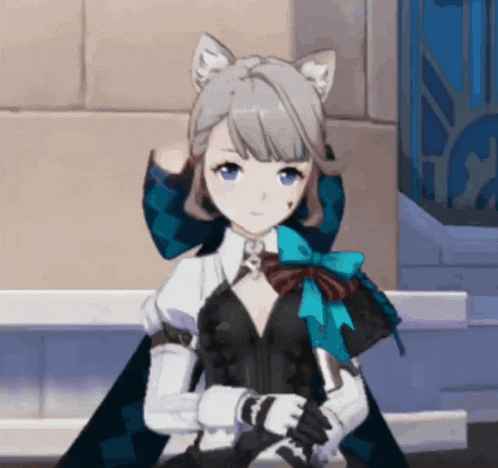 a girl with cat ears is wearing a black and white outfit with a blue bow