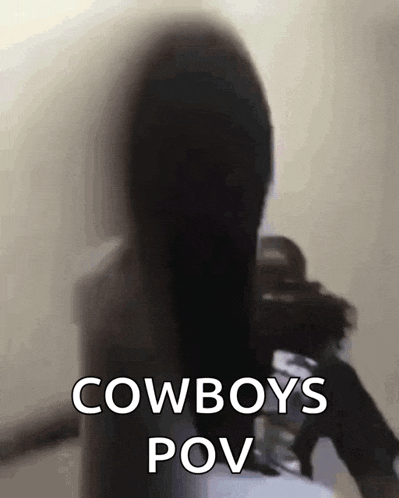a blurry picture of a woman with long hair and the words cowboys pov