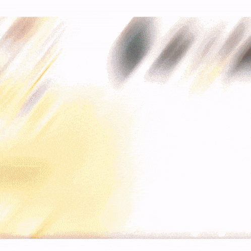 a blurred image of a person 's face with a ring on it