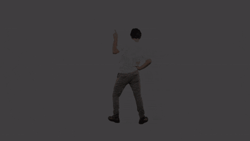 a man is standing in a spotlight with the words better start dancin above him