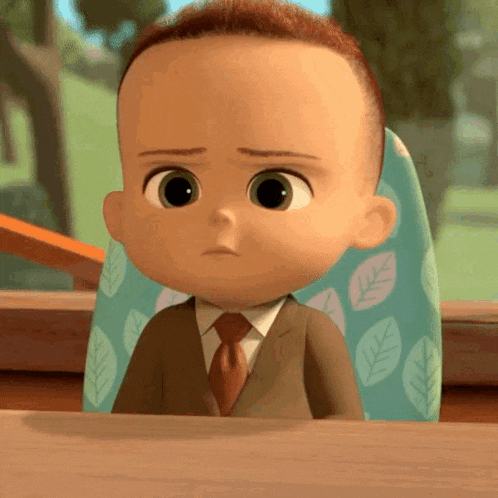 a baby in a suit and tie is sitting in a high chair looking at the camera .