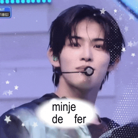 a young man with a microphone in his mouth says minje de fer in a speech bubble
