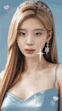 a woman with blonde hair wearing a blue dress and earrings
