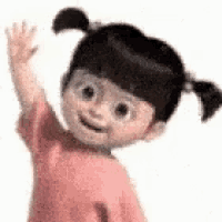 boo from monsters inc is waving her hand and smiling .