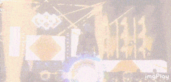 a person is walking on a stage in front of a crowd of people .