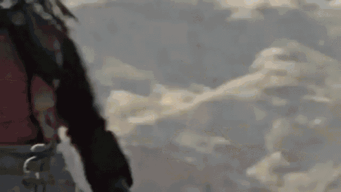 a painting of a person standing in front of a mountain with clouds in the background .