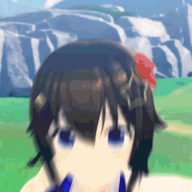 a close up of a girl 's face with a red flower in her hair