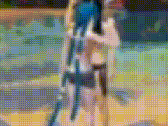 a blurry picture of a person holding a sword in their hand .