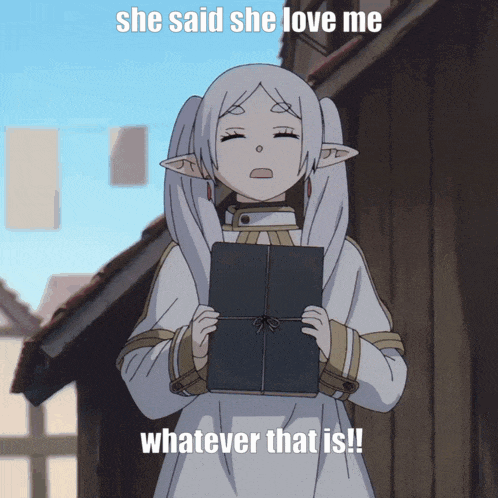 a picture of a girl holding a book with the words she said she love me whatever that is