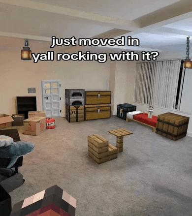 a living room filled with boxes and a tnt box on the floor