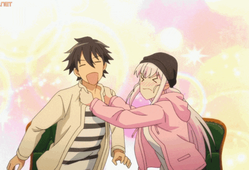a girl in a pink hoodie is standing next to a boy in a white jacket