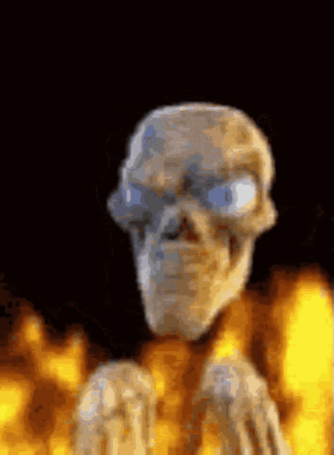 a pixelated image of a skeleton with a fire background