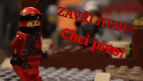 a lego figure stands in front of a sign that says zavri hubu chci pivo