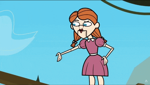 a girl in a pink dress is laying on the ground