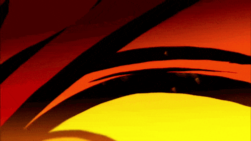 a close up of a red and yellow background with a yellow circle in the middle