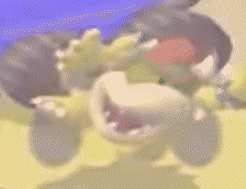 a blurred image of a cartoon character with a large mouth