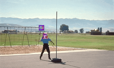 a person standing next to a pole with a sign that says " no parking " on it