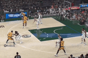 a basketball game is being played in front of a sign that says nba league pjs